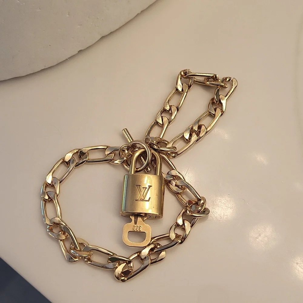 Louis vuitton trio shined by them gorgeous gold plated chocker lock key numbered